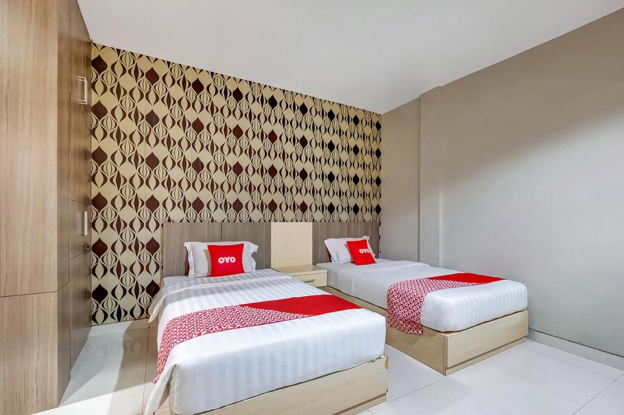 Oyo Flagship 3726 Tembok Batu Residence Tugu ภายนอก รูปภาพ